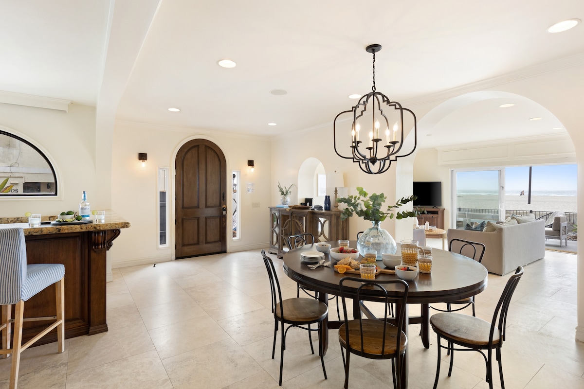Open kitchen and dining with elegant arched architecture